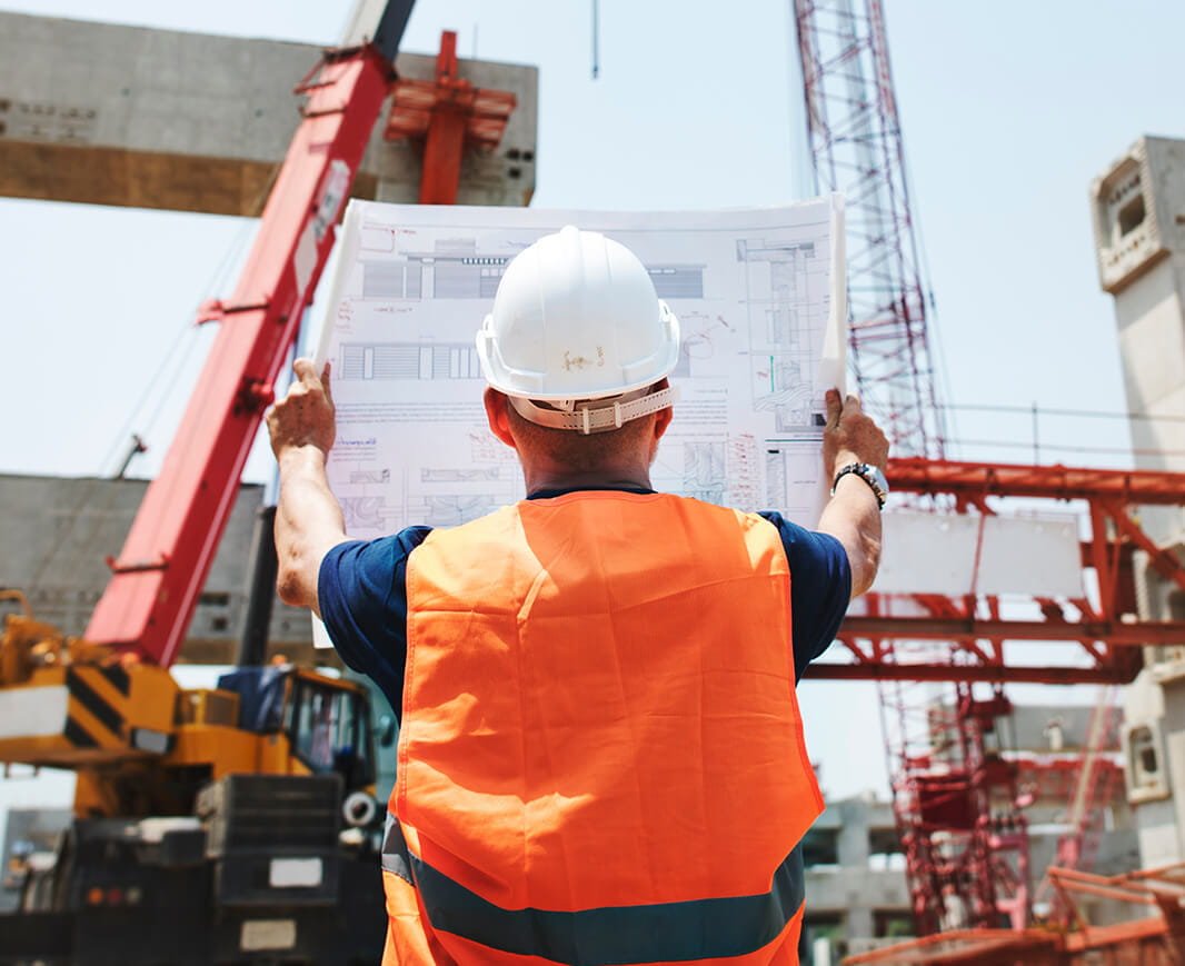Engineer on site reviewing construction work